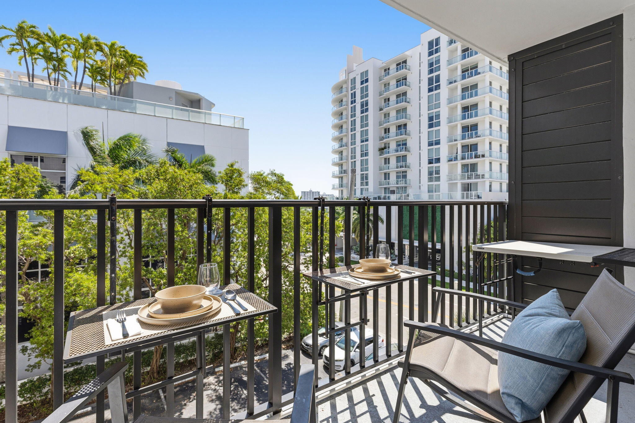 3000 Riomar Street, Unit 407 Fort Lauderdale, FL 33304 - Photo 24 of 38 a view of a balcony with chairs