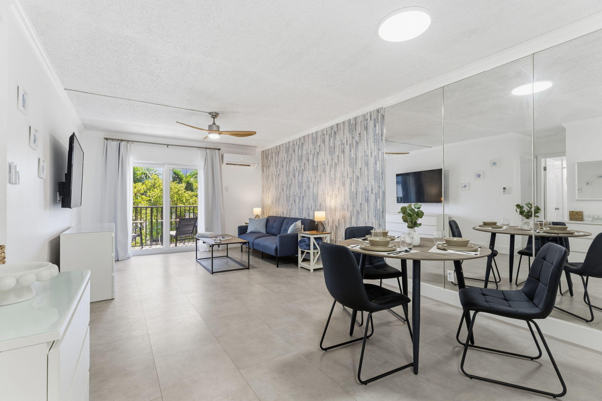 3000 Riomar Street, Unit 407 Fort Lauderdale, FL 33304 - Photo 8 of 38 a view of a livingroom with furniture and a table