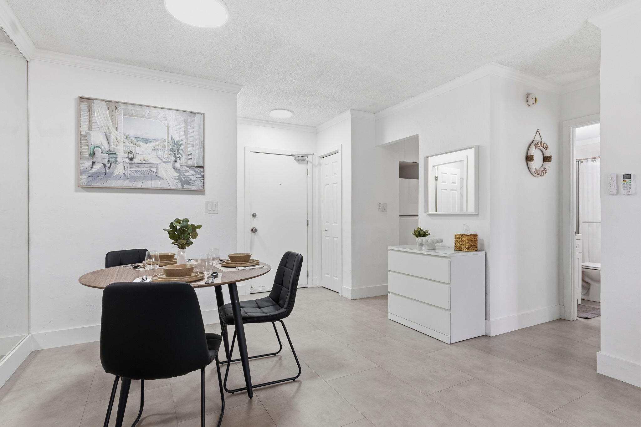 3000 Riomar Street, Unit 407 Fort Lauderdale, FL 33304 - Photo 10 of 38 a dining room with furniture and window