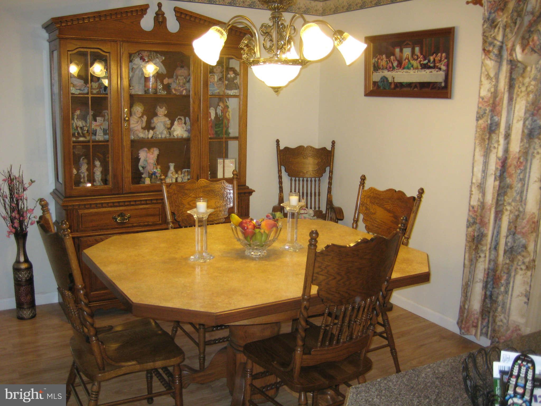 1780 Melbourne Road Baltimore, MD 21222 - Photo 11 of 25 a dining room with furniture and window