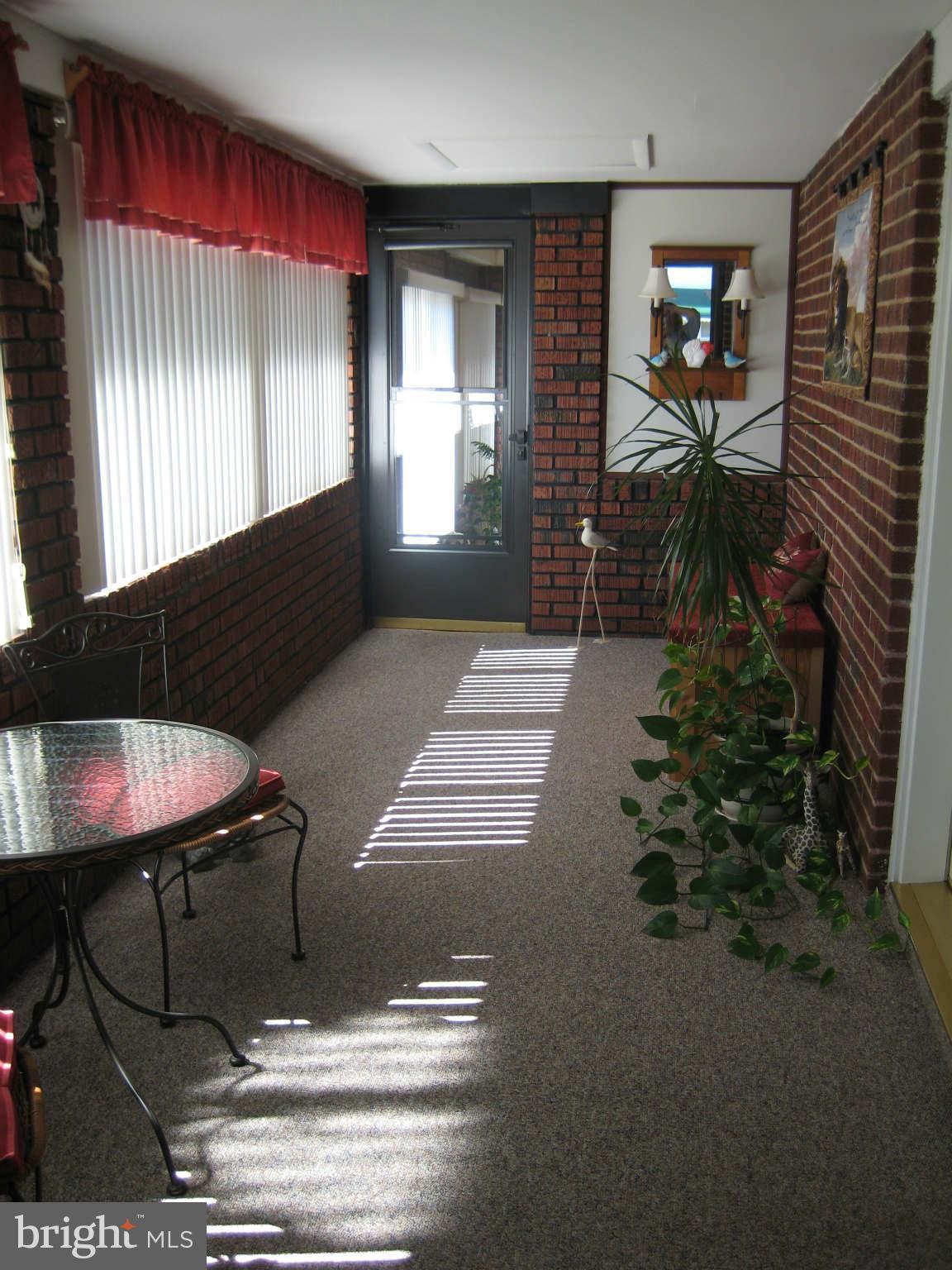 1780 Melbourne Road Baltimore, MD 21222 - Photo 15 of 25 a living room with furniture and a window