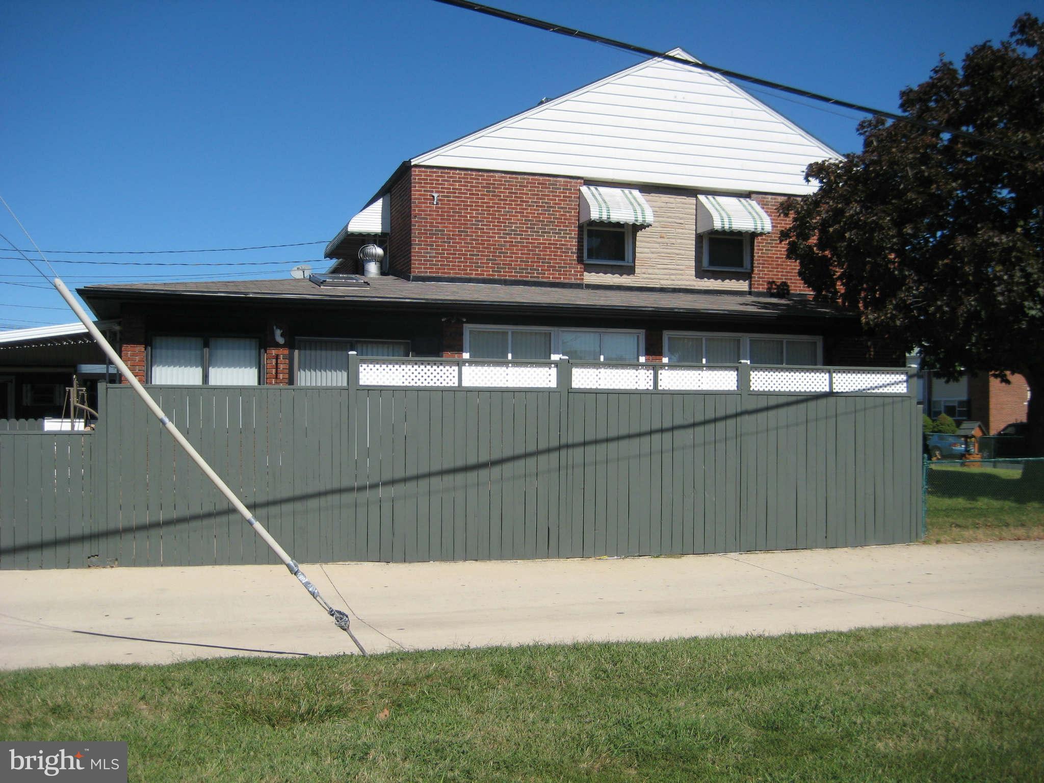 1780 Melbourne Road Baltimore, MD 21222 - Photo 3 of 25 a front view of a house with a garage