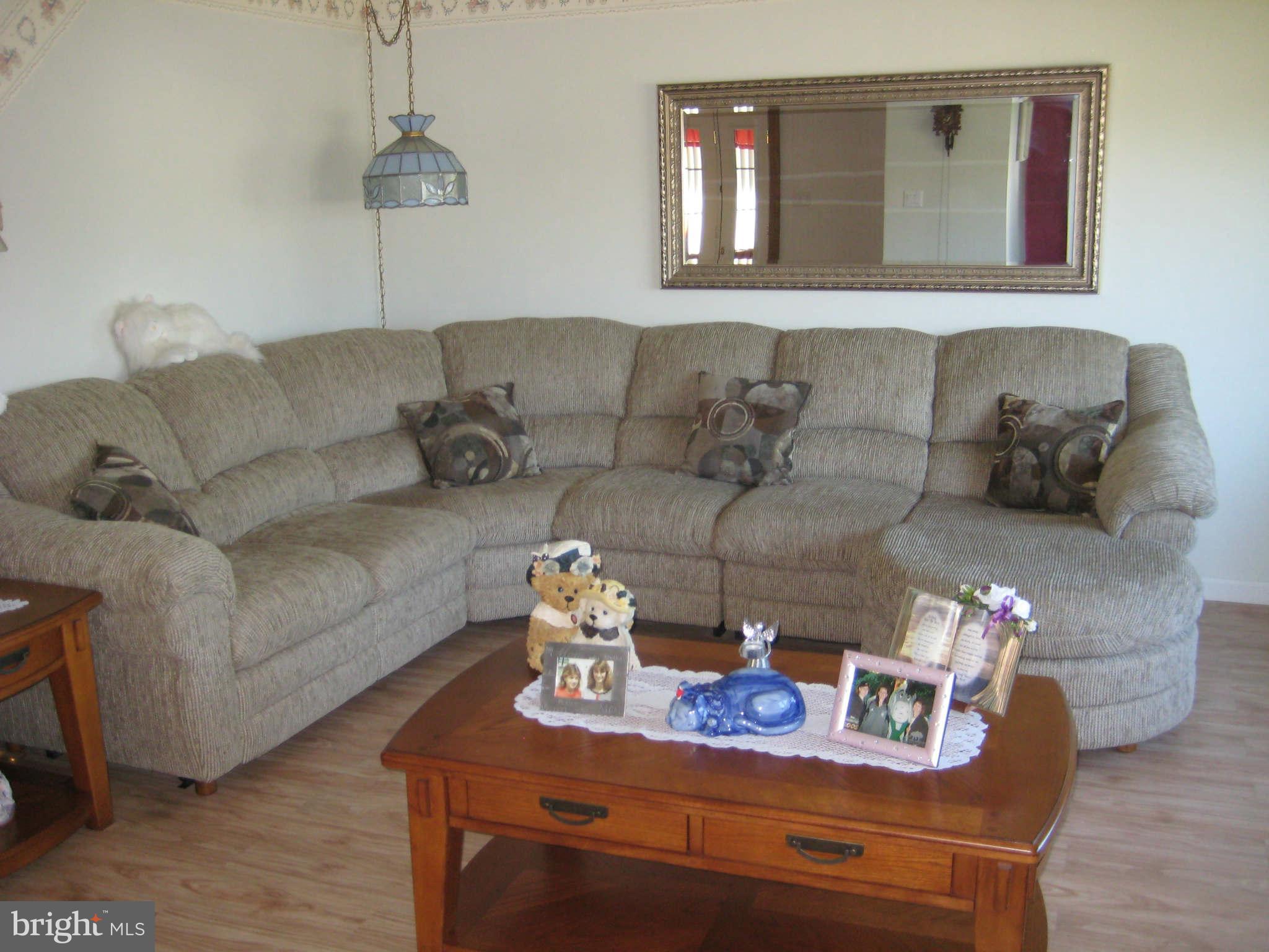 1780 Melbourne Road Baltimore, MD 21222 - Photo 8 of 25 a living room with furniture and wooden floor