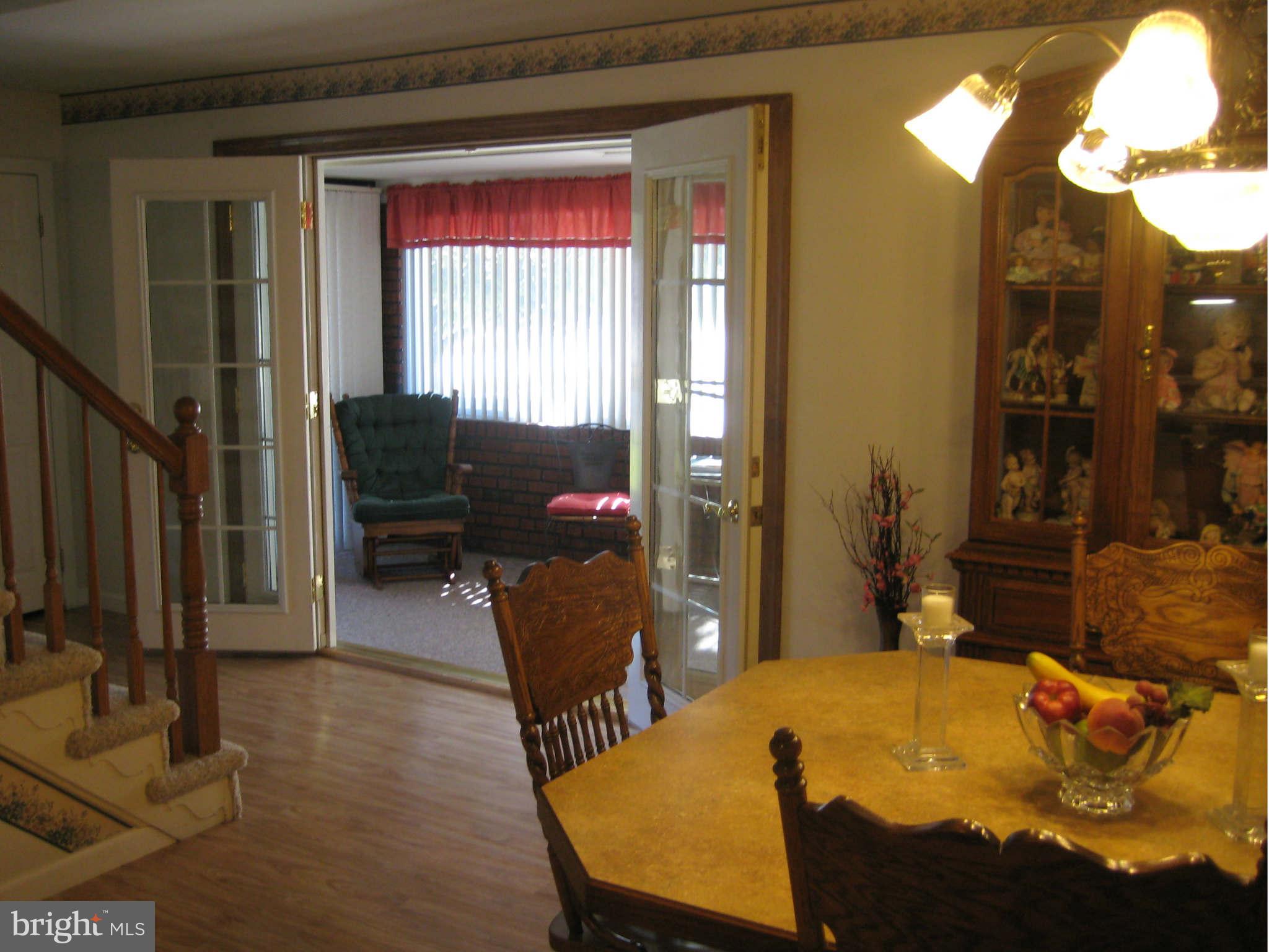 1780 Melbourne Road Baltimore, MD 21222 - Photo 10 of 25 a bed room with furniture and wooden floor
