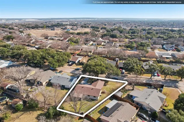 an aerial view of a city with lots of residential buildings