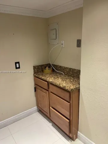 a utility room with washer and dryer