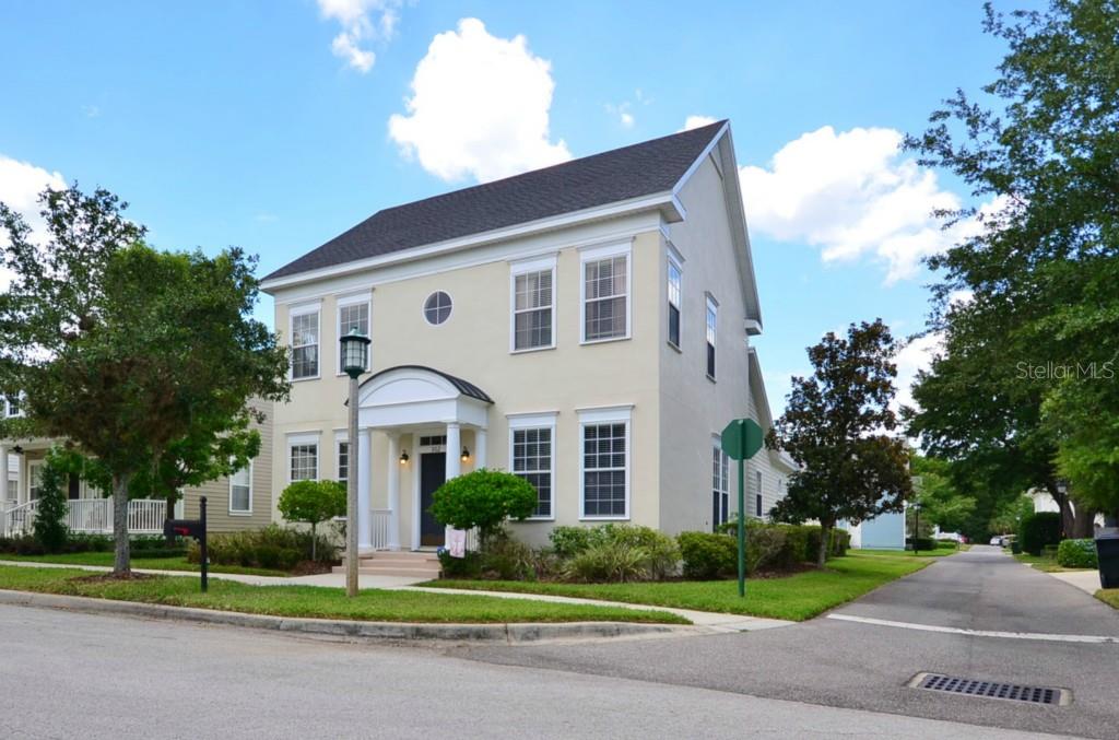 302 Reeves Street Celebration, FL 34747 - Photo 1 of 1 a front view of a house with a yard