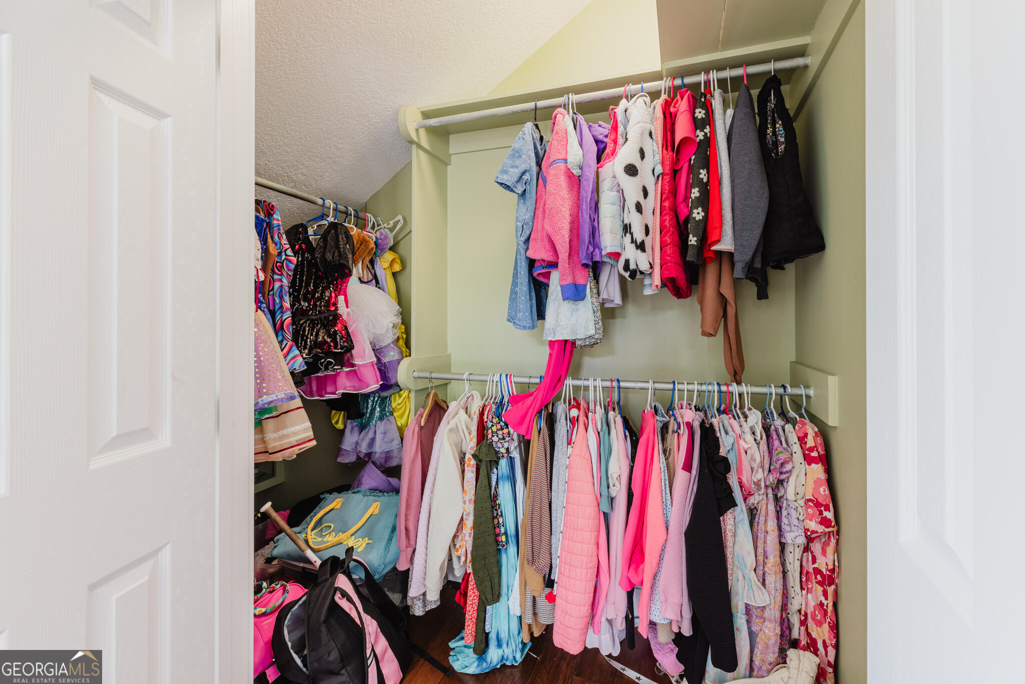 1859 Upper River Road Americus, GA 31709 - Photo 41 of 47 a view of walk in closet with clothes