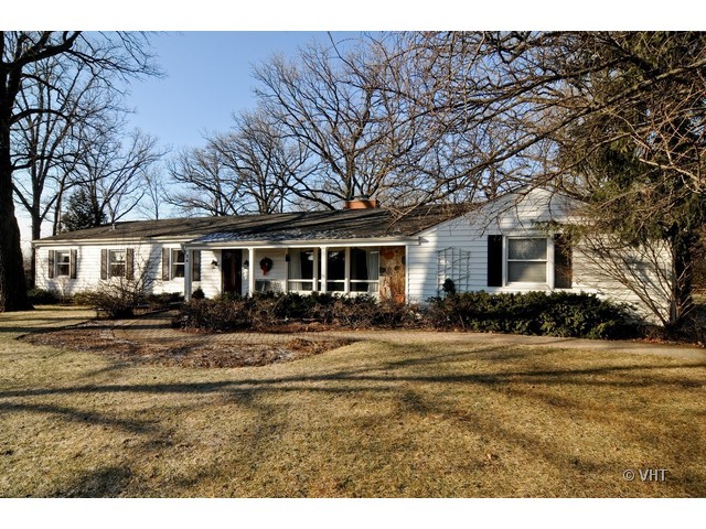 34 North Ridge Road Lake Forest, IL 60045 - Photo 1 of 8 a front view of a house with a yard