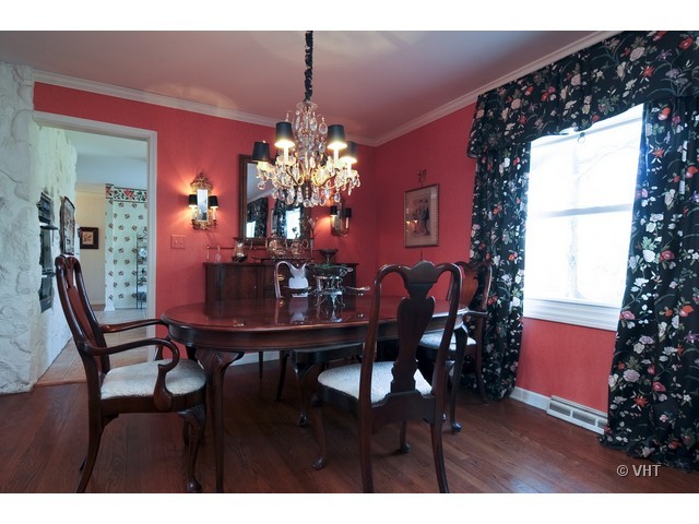 34 North Ridge Road Lake Forest, IL 60045 - Photo 3 of 8 a view of a dining room with furniture and chandelier
