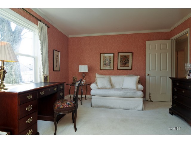 34 North Ridge Road Lake Forest, IL 60045 - Photo 5 of 8 a living room with furniture a large window and a dresser
