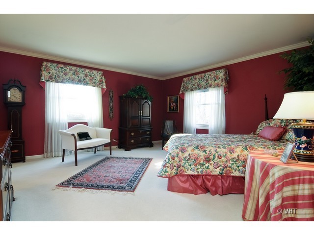 34 North Ridge Road Lake Forest, IL 60045 - Photo 7 of 8 a bedroom with a bed and window
