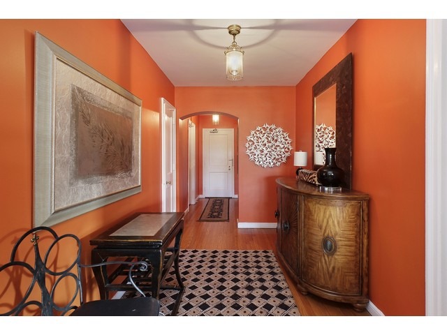 5555 North Sheridan Road, Unit 307 Chicago, IL 60640 - Photo 2 of 10 a room with furniture and window