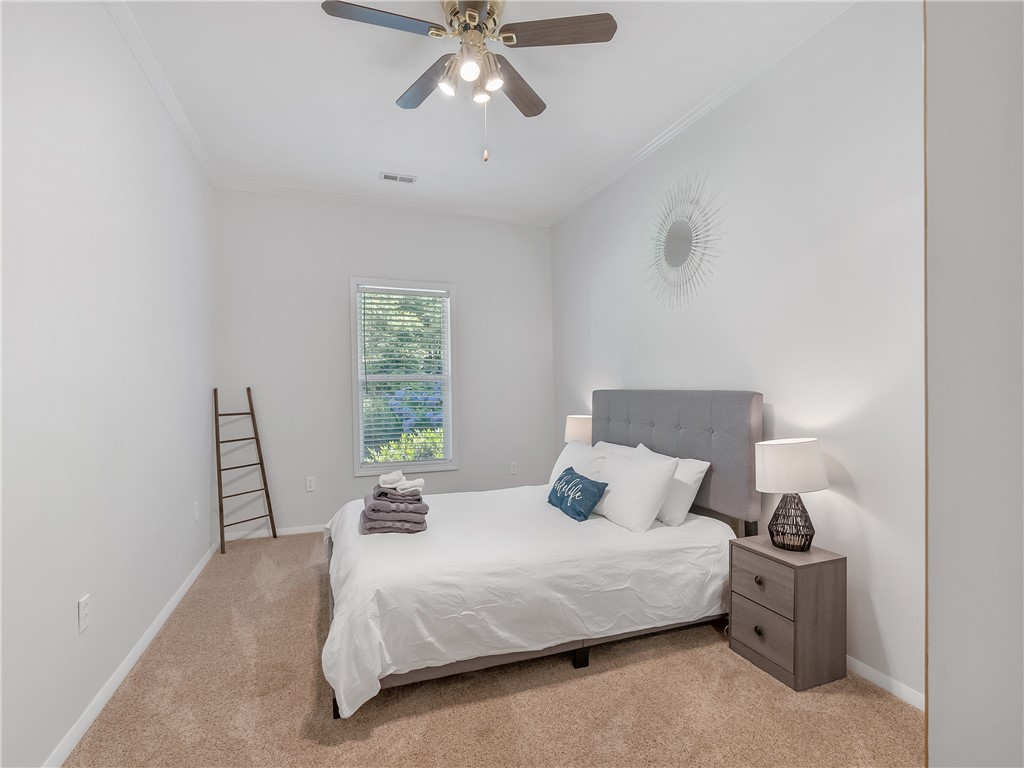 304 Whitewater Lake Road Tamassee, SC 29686 - Photo 21 of 36 main floor bedroom