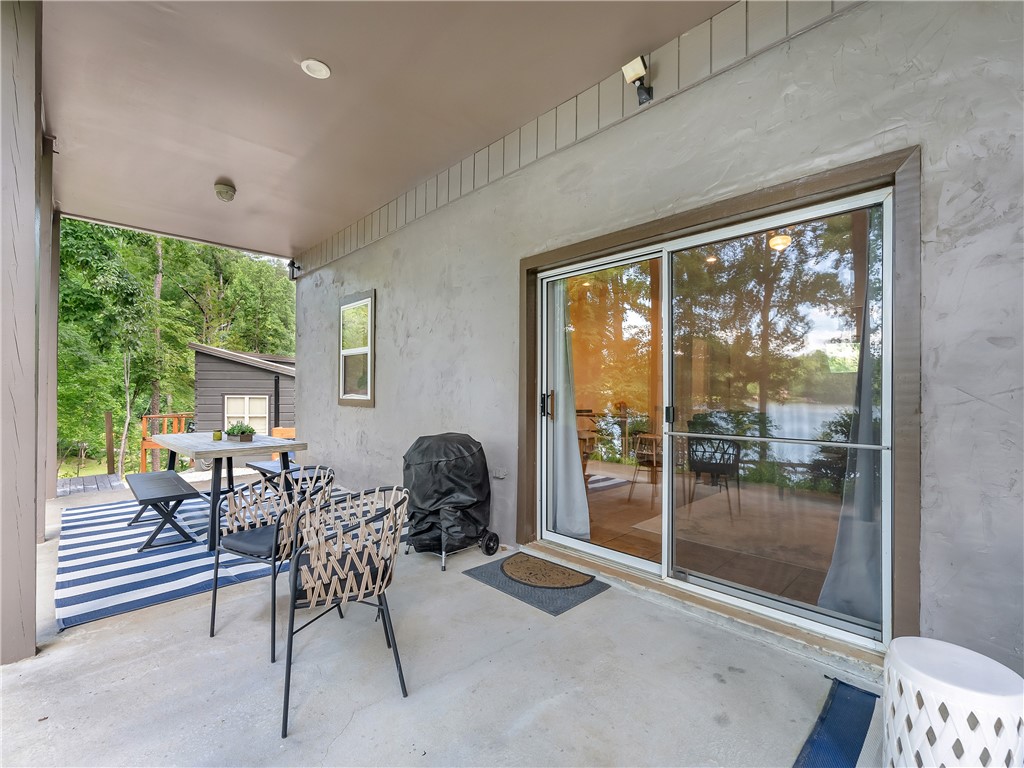 304 Whitewater Lake Road Tamassee, SC 29686 - Photo 24 of 36 lower level patio