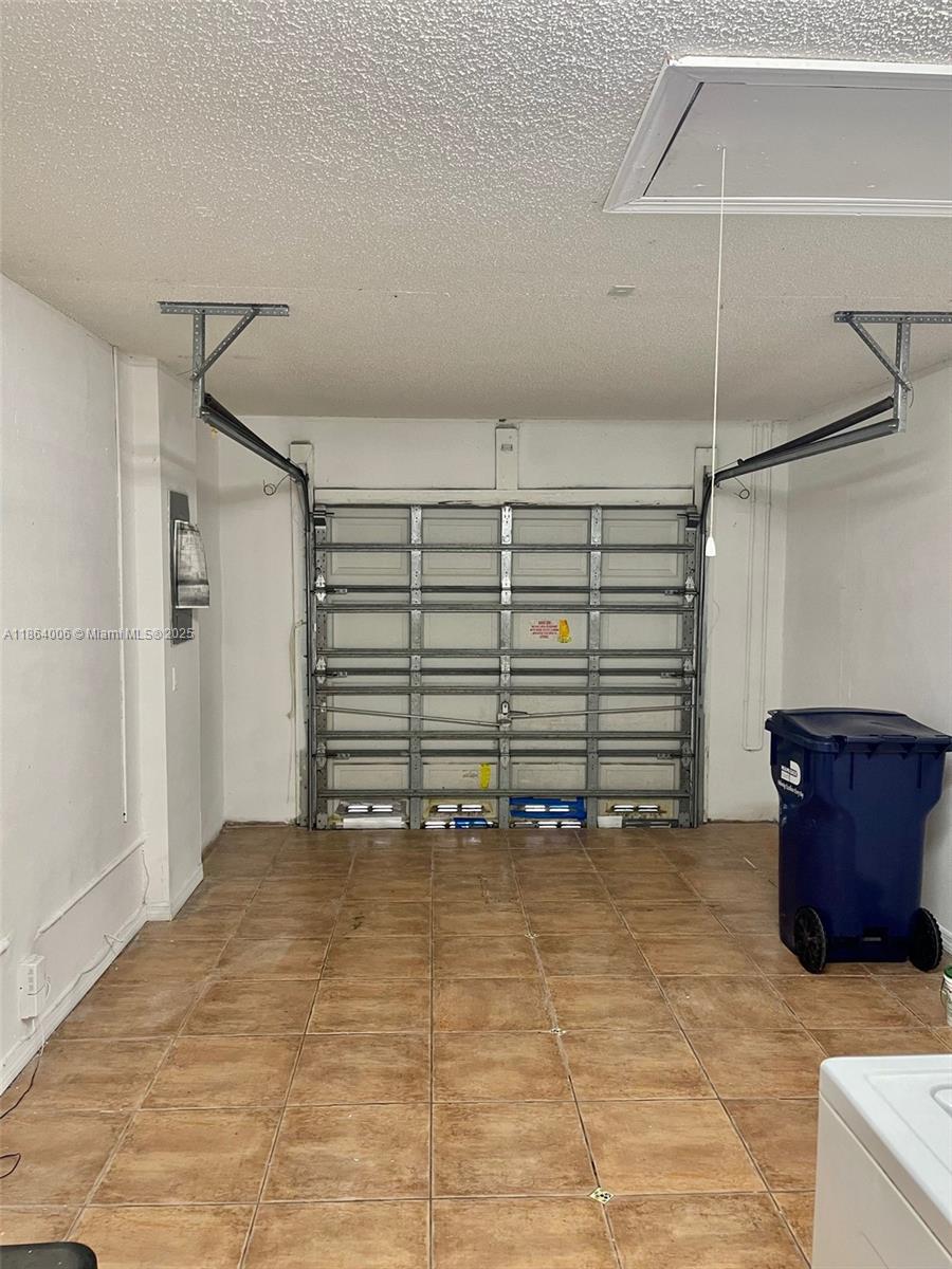 7362 Southwest 162nd Place Miami, FL 33193 - Photo 12 of 22 a view of a room with stairs and a couch