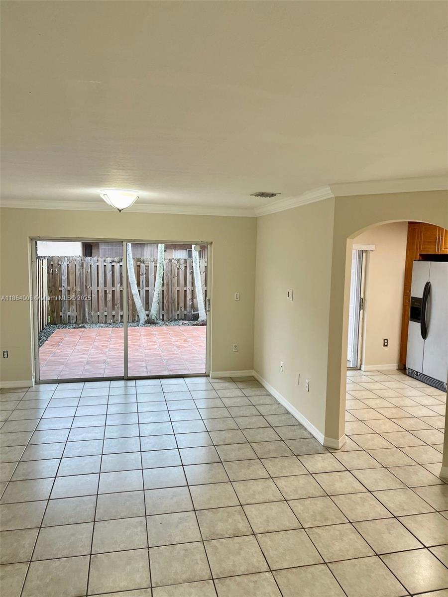 7362 Southwest 162nd Place Miami, FL 33193 - Photo 14 of 22 a view of an empty room and window