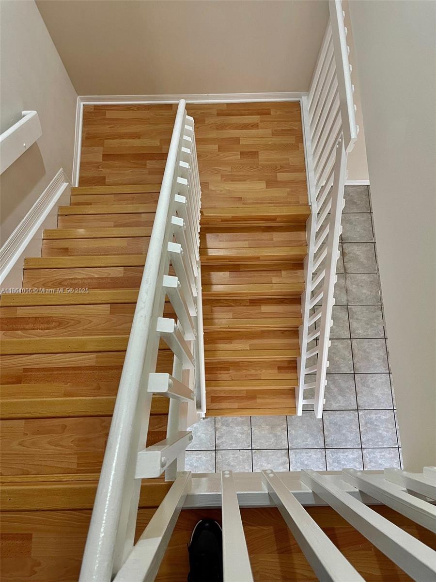 7362 Southwest 162nd Place Miami, FL 33193 - Photo 19 of 22 a view of balcony with wooden floor and windows
