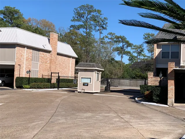 a view of a house with a street