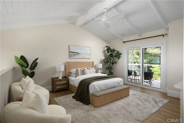 a bedroom with two beds and painted walls