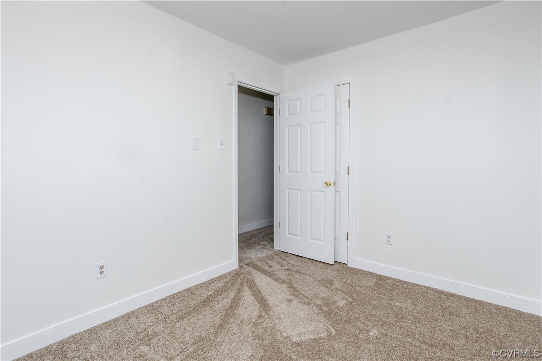 4518 Twelveoaks Road Midlothian, VA 23112 - Photo 8 of 21 an empty room with an entryway