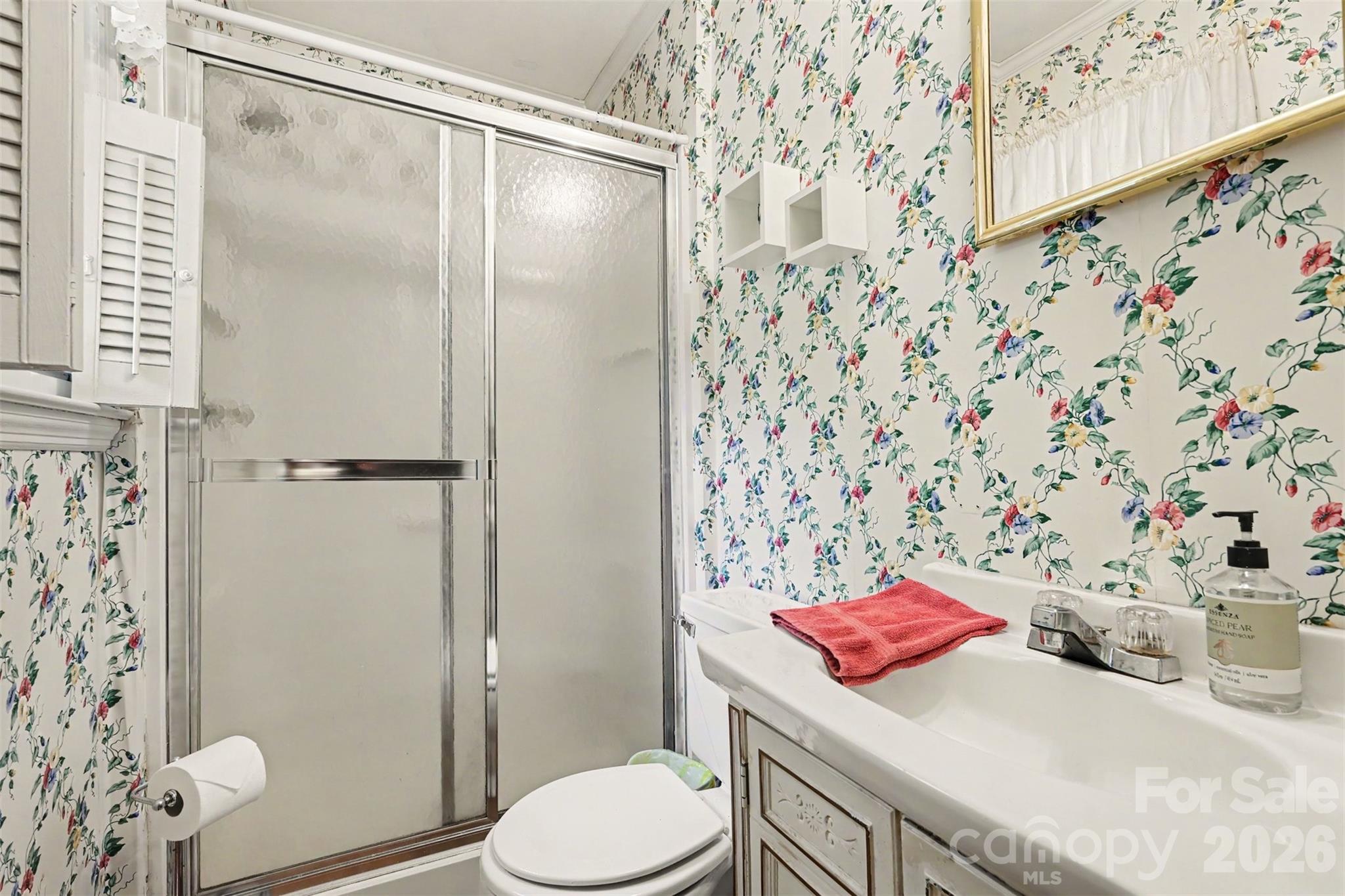6774 Woodhaven Road Kershaw, SC 29067 - Photo 28 of 30 a bathroom with a sink toilet and shower