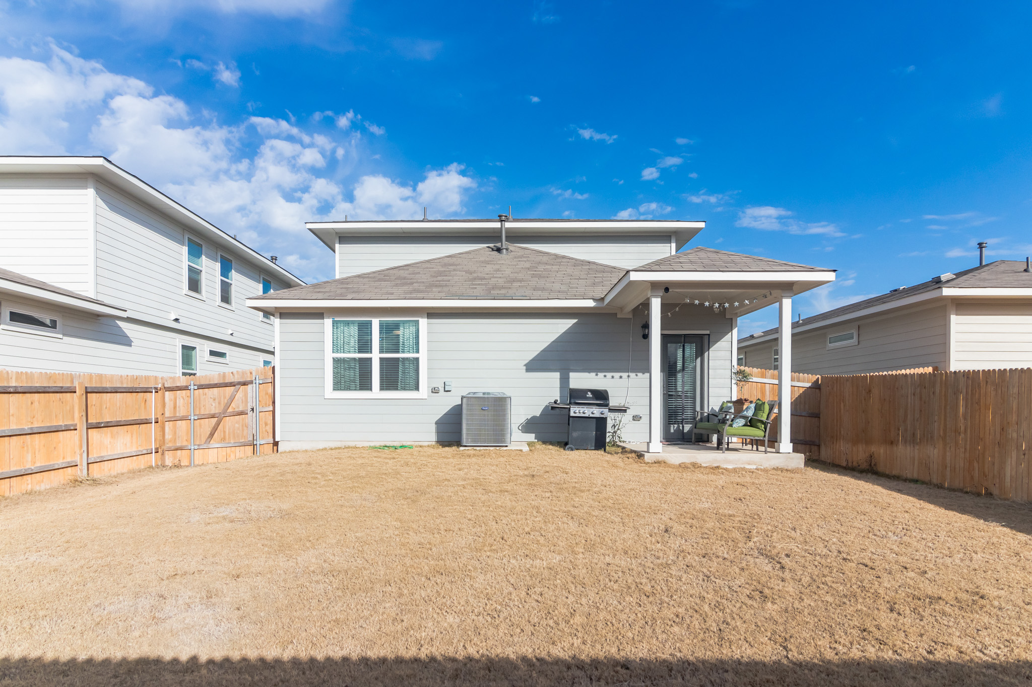 116 Century Plant Road Leander, TX 78641 - Photo 28 of 30 A spacious backyard is enclosed by a wood privacy fence.