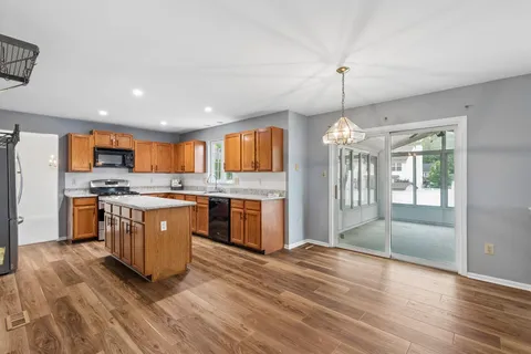 a kitchen with a sink and a stove