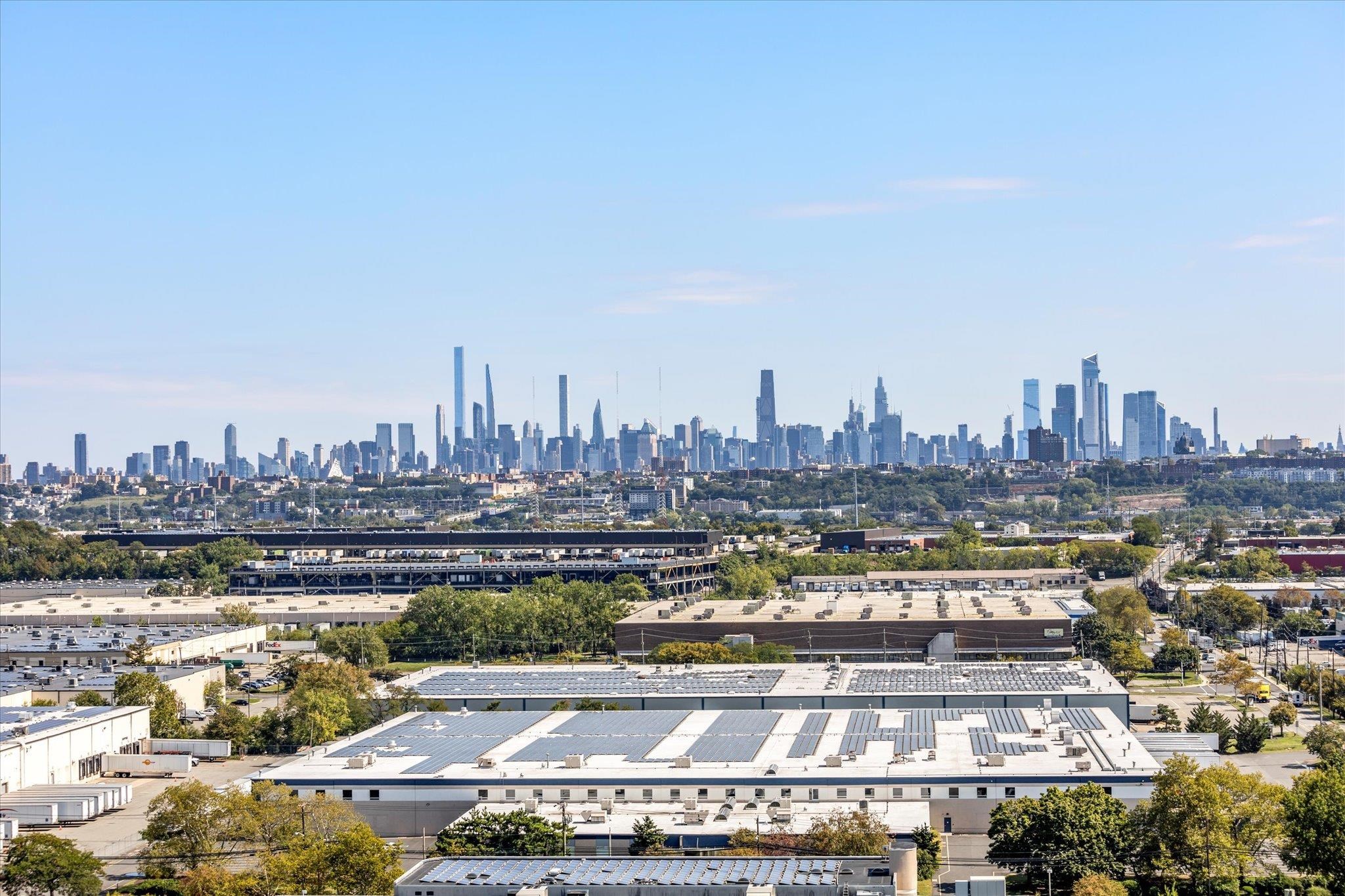 1705 Harmon Cove Tower, Unit 1705 Secaucus, NJ 07094 - Photo 19 of 49 a view of a city with tall buildings