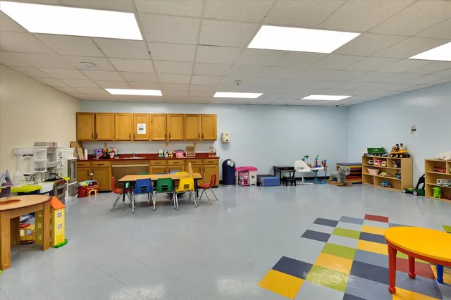 a play room with lots of furniture