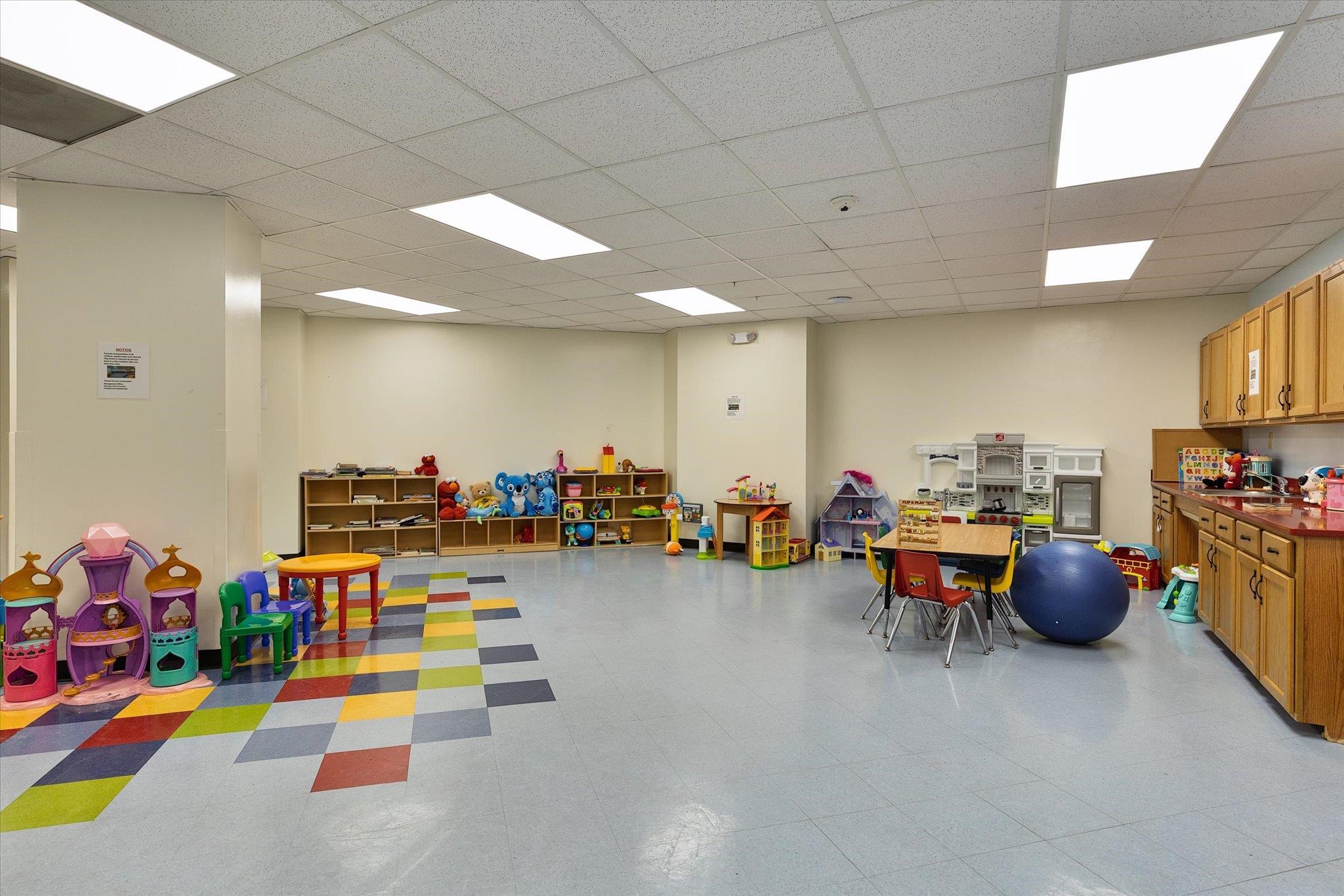 1705 Harmon Cove Tower, Unit 1705 Secaucus, NJ 07094 - Photo 48 of 49 a play room with lots of furniture