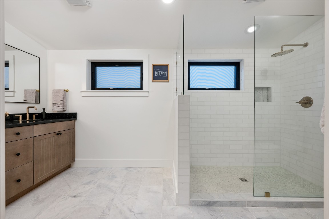 6309 Walnut Hills Drive, Unit B Austin, TX 78723 - Photo 6 of 12 a bathroom with a shower