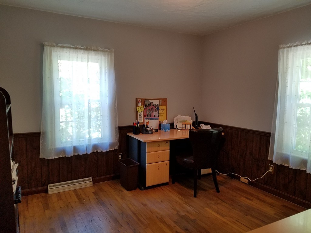 110 Hunt Road Chelmsford, MA 01824 - Photo 13 of 26 a living room with furniture window and wooden floor