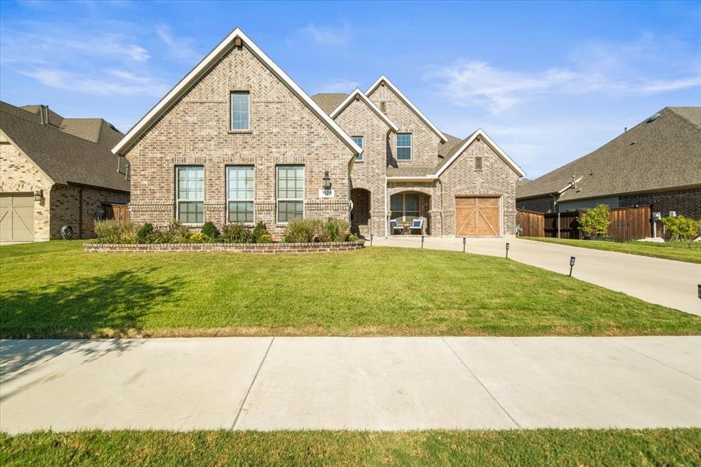 1200 South Mitchell Road Mansfield, TX 76063 - Photo 1 of 1 a view of house with garden