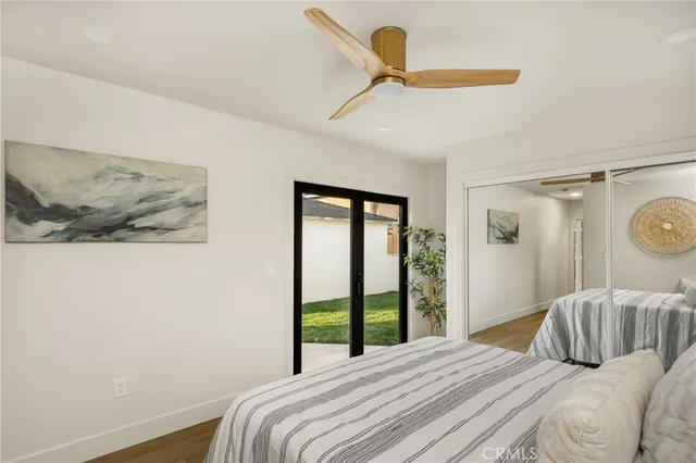 a bedroom with a bed and lamp