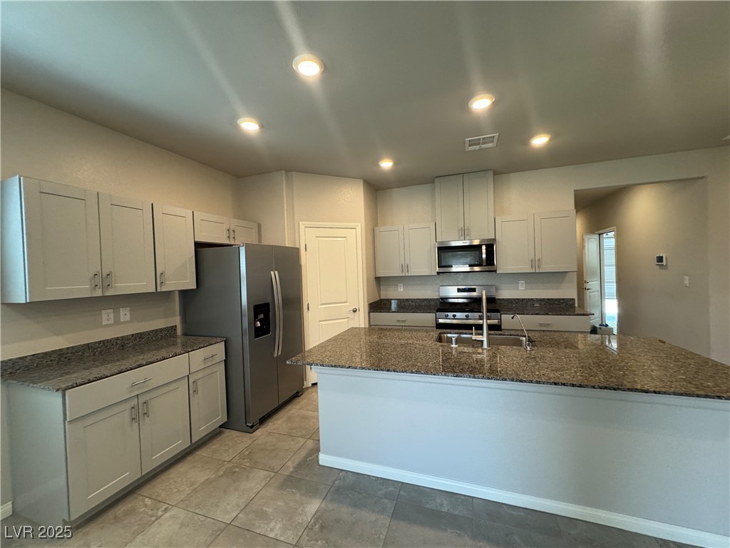 7560 Blue Lotus Avenue Las Vegas, NV 89113 - Photo 3 of 24