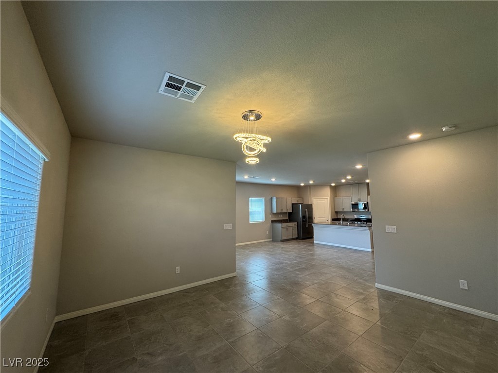 7560 Blue Lotus Avenue Las Vegas, NV 89113 - Photo 5 of 24