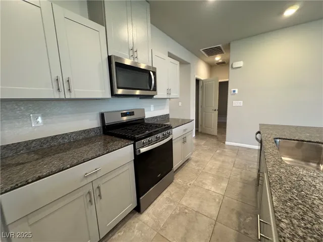 $2,380 | 7560 Blue Lotus Avenue, Las Vegas, NV 89113