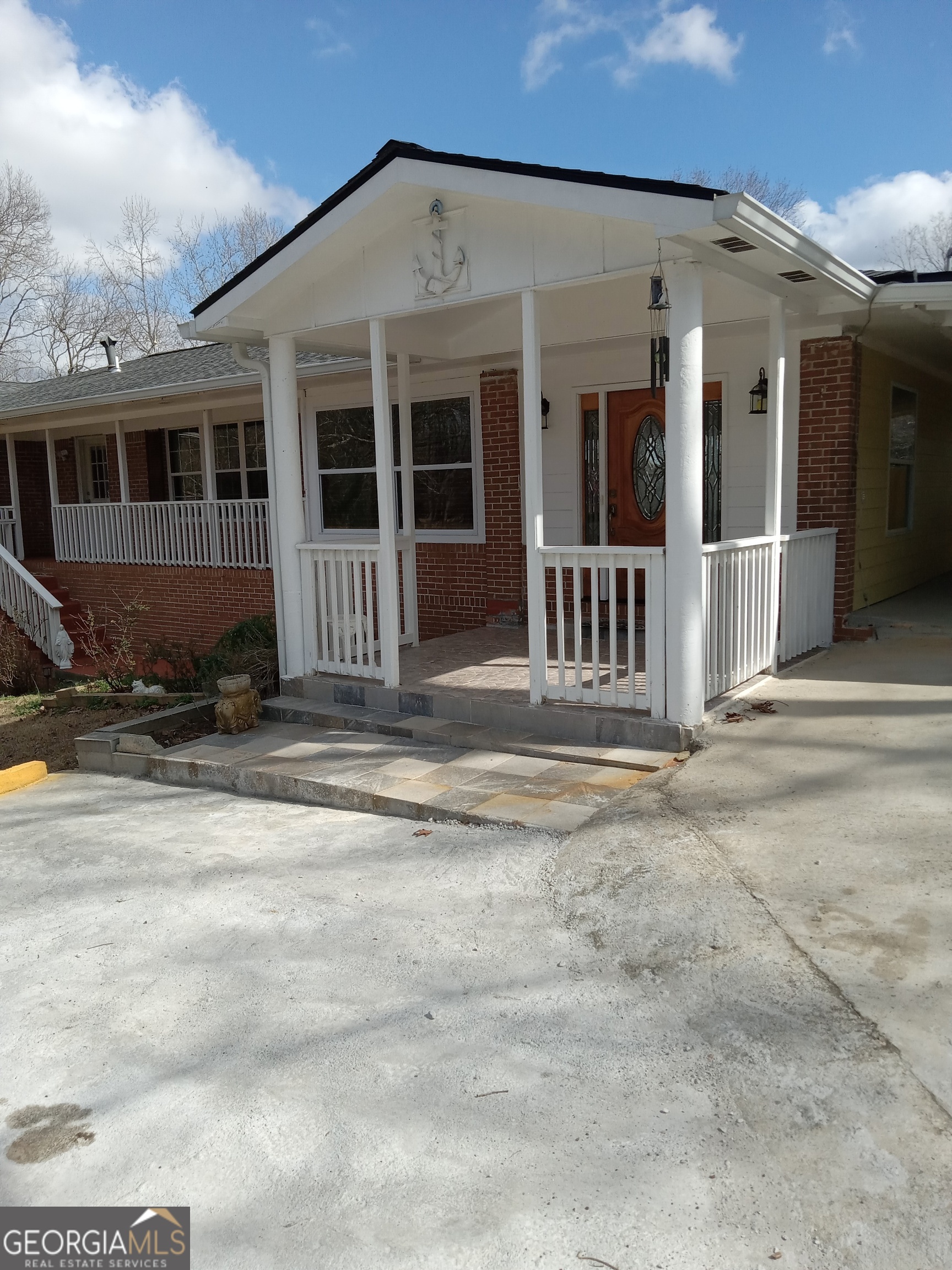 148 West James Circle Hampton, GA 30228 - Photo 2 of 13 a view of a house with a fence
