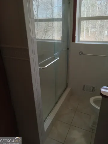 a bathroom with a window