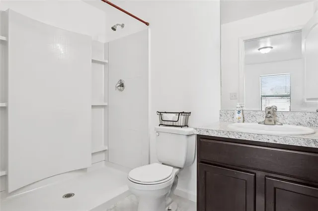 a bathroom with a sink and a toilet