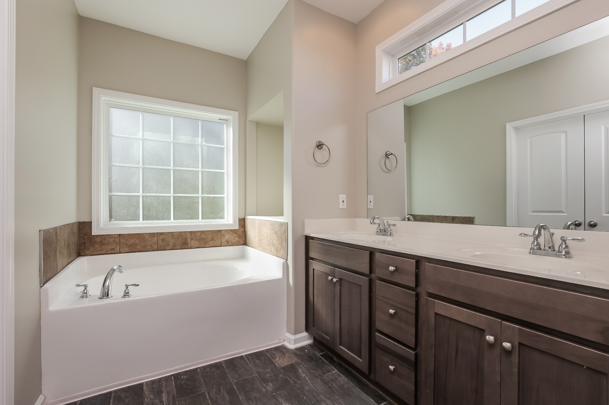 901 Beverly Court Spring Hill, TN 37174 - Photo 10 of 12 a bathroom with a tub sink and mirror