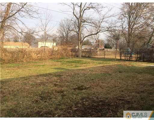 23 Colton Road Edison, NJ 08817 - Photo 12 of 12 a view of big yard with a house