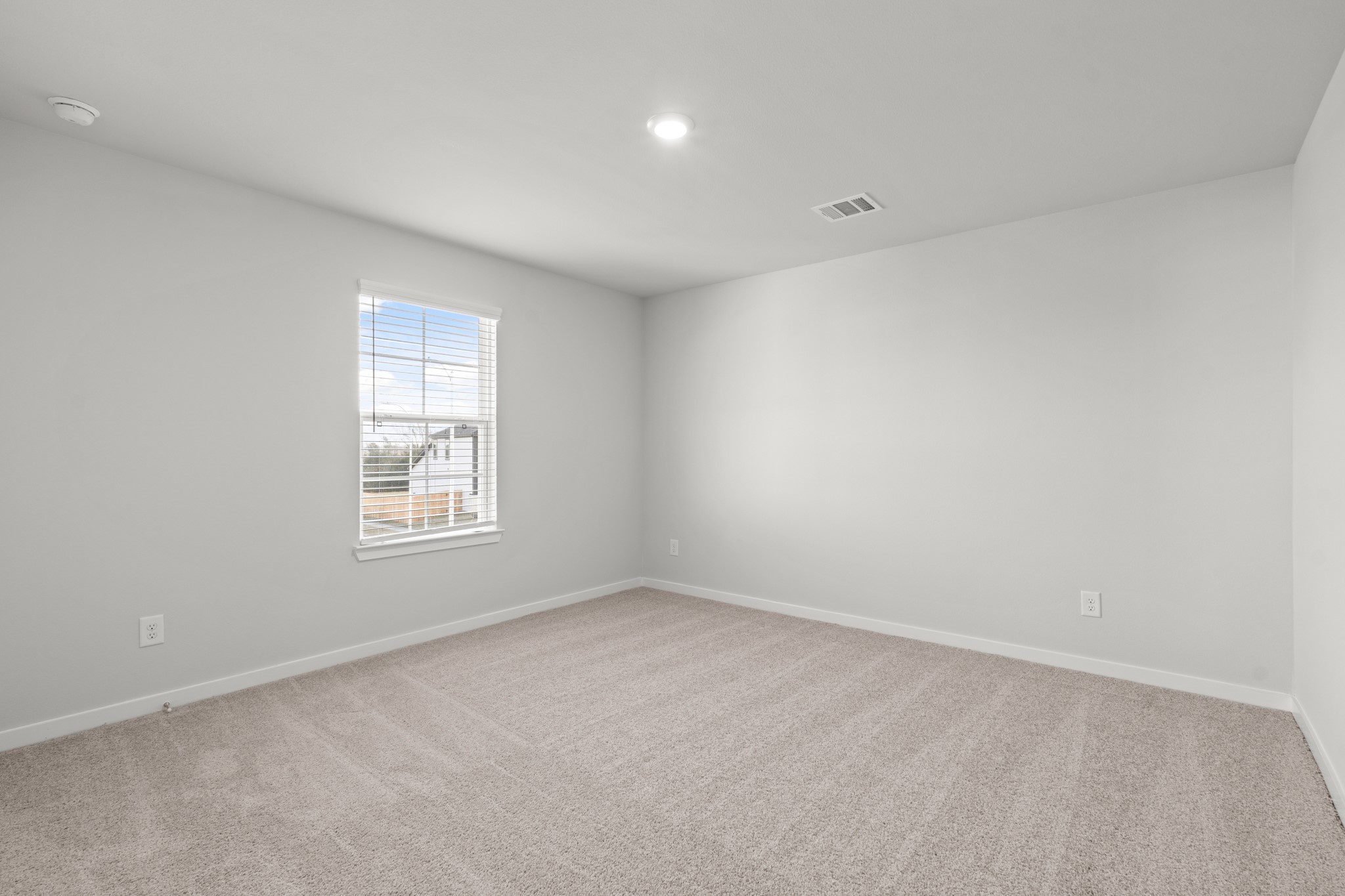 513 Wax Myrtle Way Hockley, TX 77447 - Photo 19 of 27 an empty room with a window