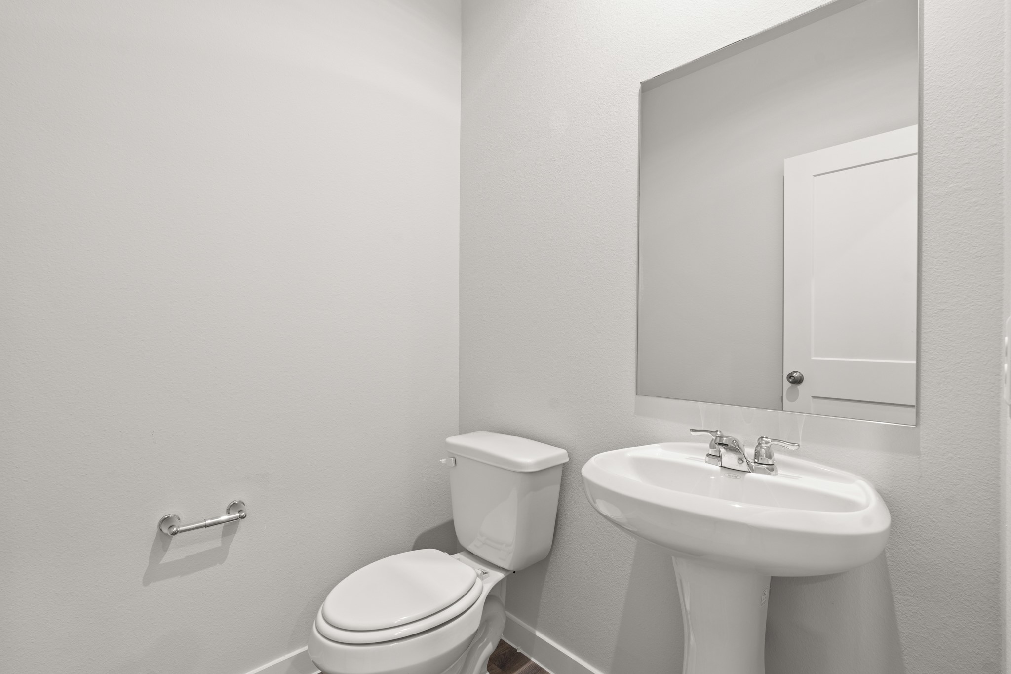 513 Wax Myrtle Way Hockley, TX 77447 - Photo 6 of 27 a bathroom with a sink toilet and a mirror