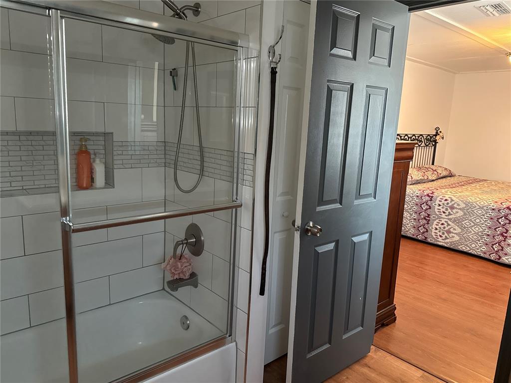 4560 Lamson Avenue Spring Hill, FL 34608 - Photo 18 of 41 a bathroom with a shower