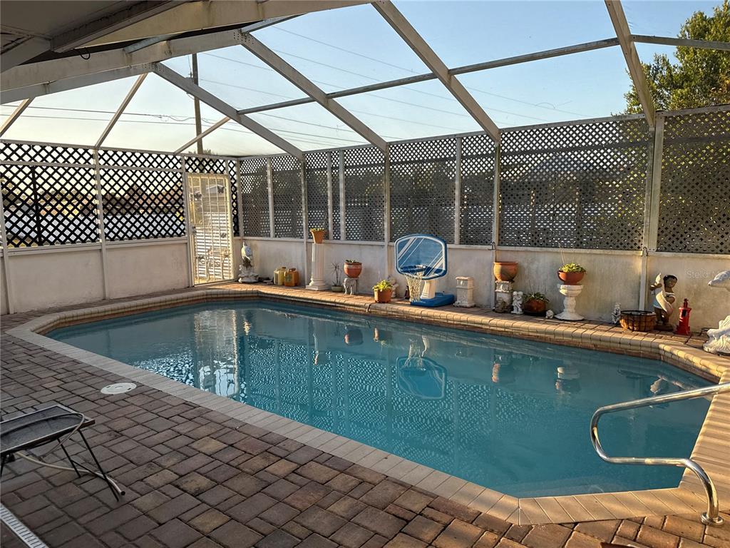 4560 Lamson Avenue Spring Hill, FL 34608 - Photo 35 of 41 a view of a kitchen with a sink and cabinets