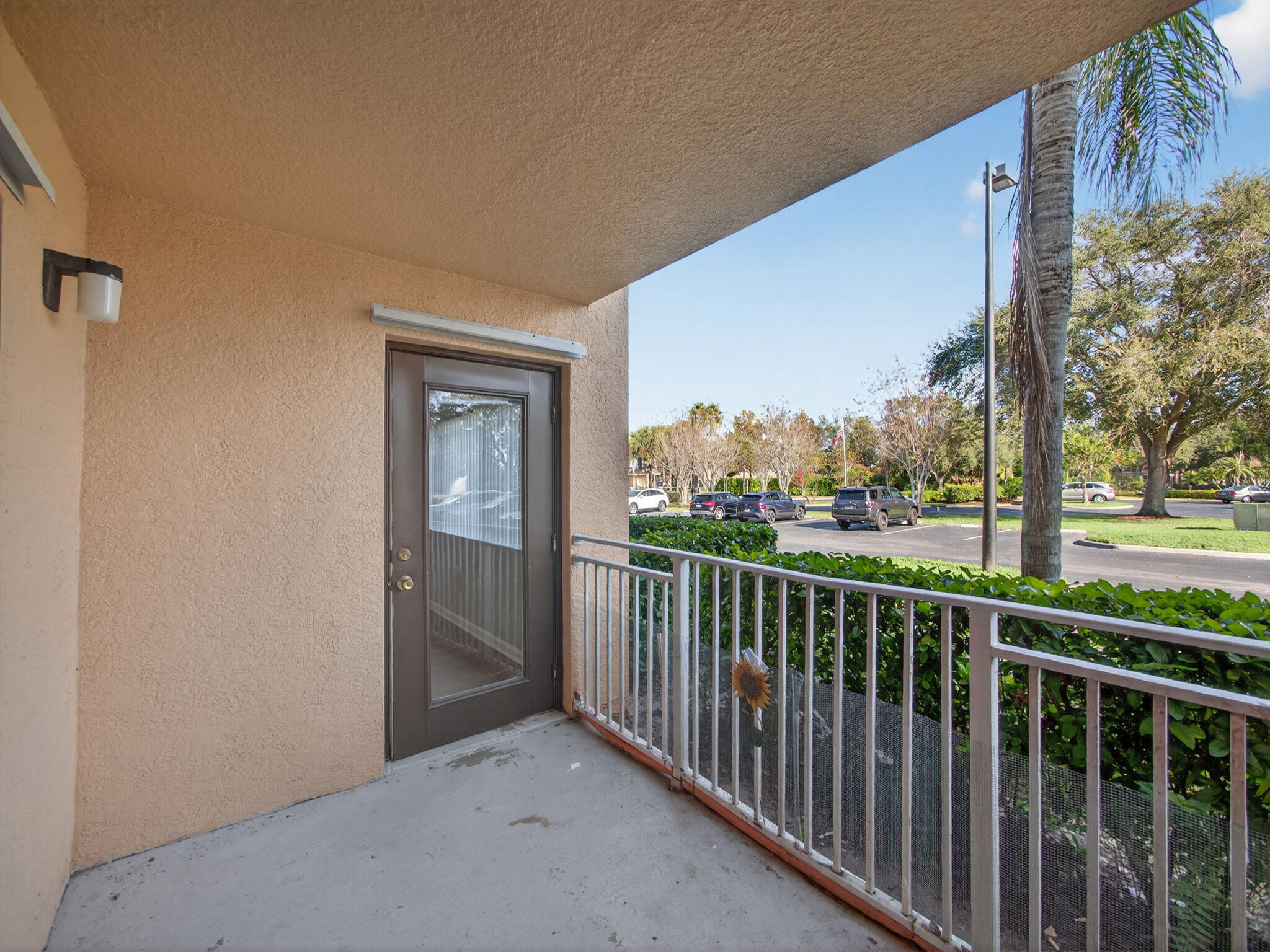 121 Southwest Palm Drive, Unit 107 Port St. Lucie, FL 34986 - Photo 15 of 15 a view of a balcony with city view