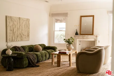 a living room with furniture and a couch