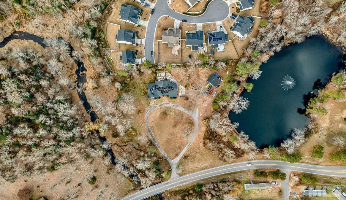 4208 Forestville Road Raleigh, NC 27616 - Photo 2 of 6 a picture of a tree with a yard